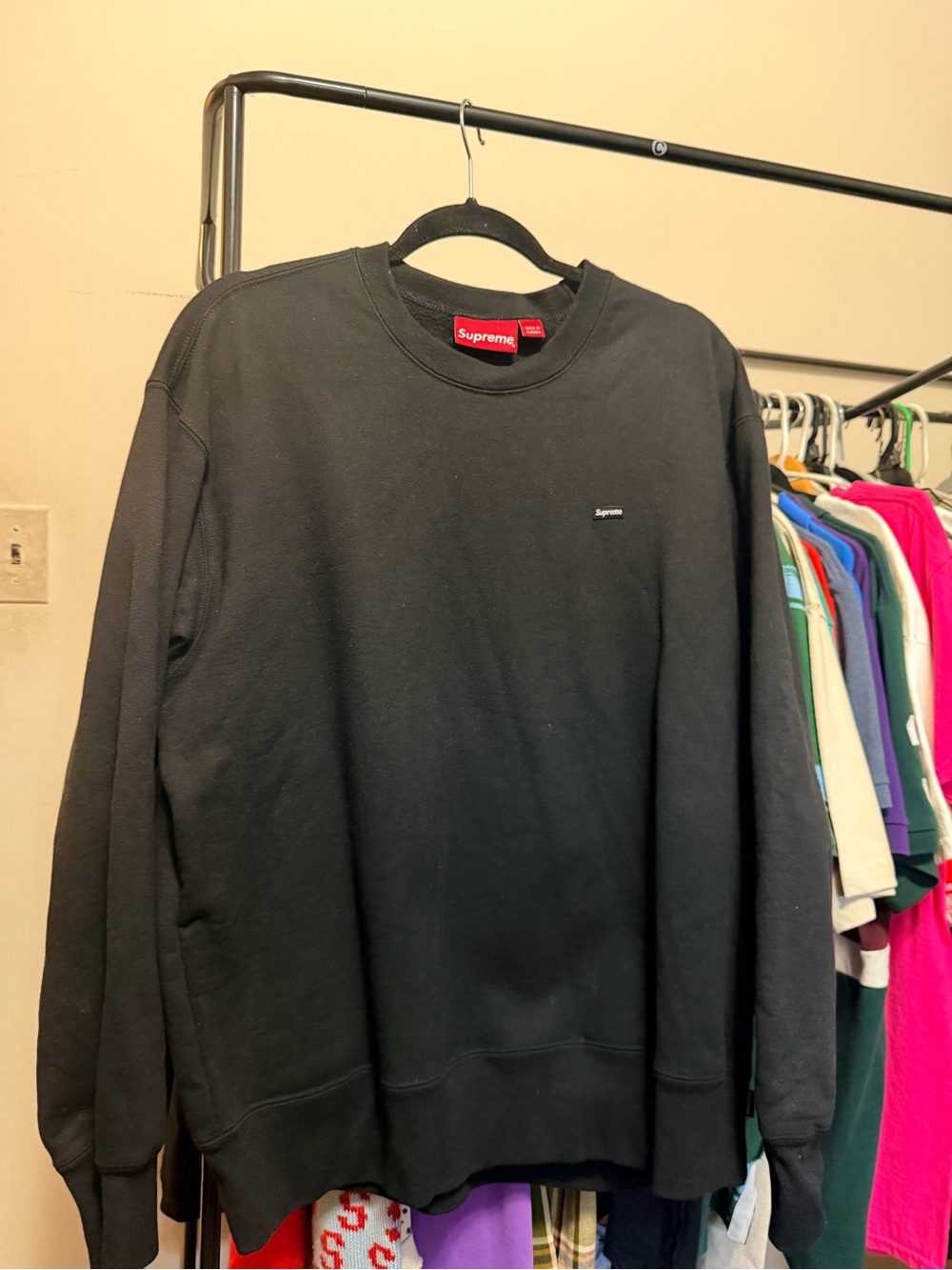 Supreme Black Crewneck with Small Red Tag